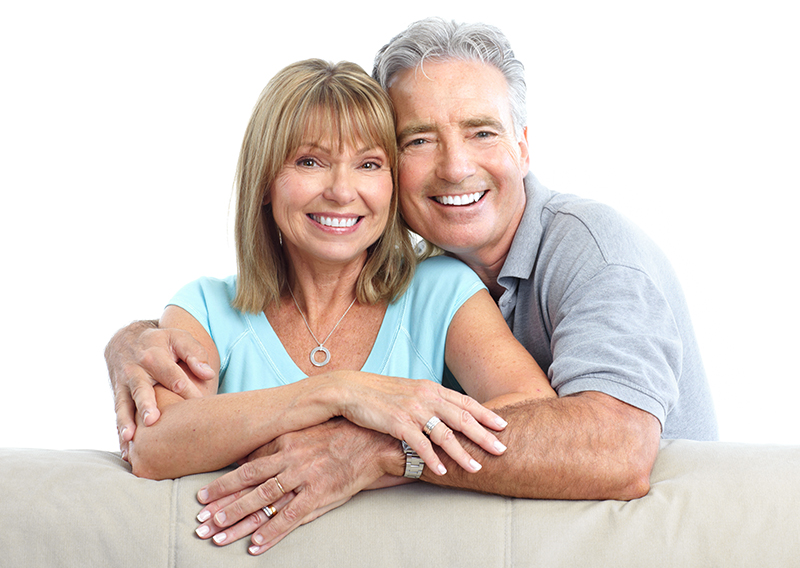 Senior Happy Couple With Dental Implants From Aura Family Dental